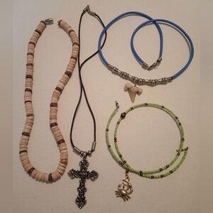 #689.  4 Piece Assorted Cross, Shark Tooth, Wood & Seed Bead Necklace Bundle